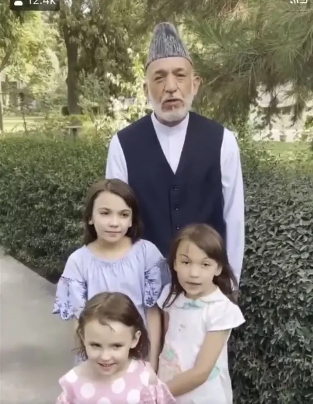 Hamid Karzai and his children in a recorded video