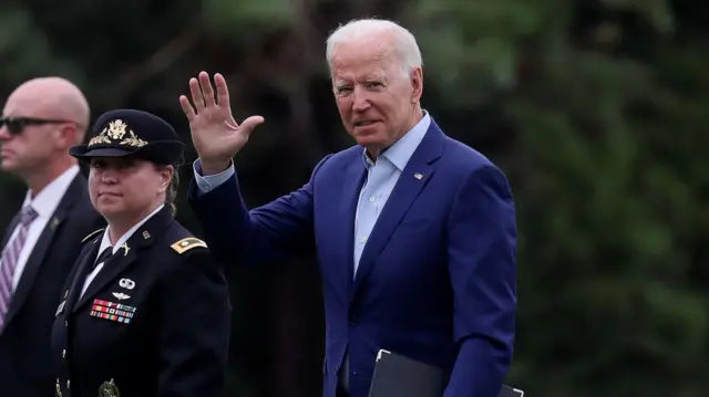 Joe Biden waves