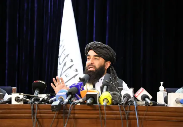 Taliban spokesperson Zabihullah Mujahid answers press members questions as he holds a press conference in Kabul, Afghanistan on August 17, 2021.