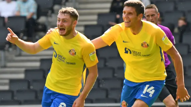 Elliot Embleton (left) celebrates a goal for Sunderland