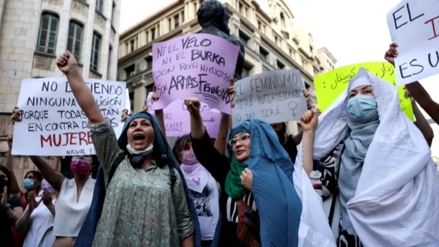 Afghan women living in Barcelona attend a protest in front of the UN headquarters, Spain, 17 August 2021