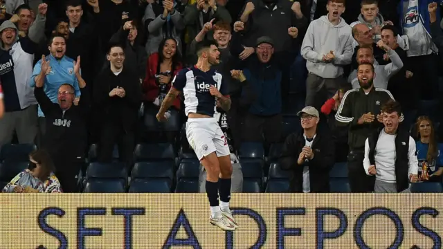 Alex Mowatt celebrates