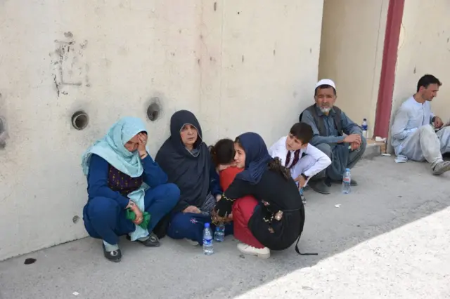 Afghans continue to wait at Kabul International Airport