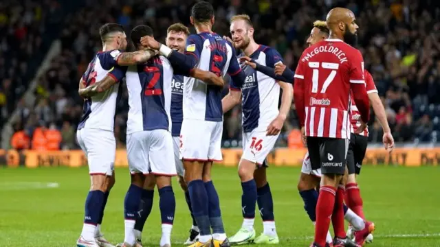 West Brom players celebrate one of their four goals