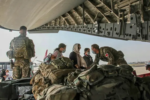 British citizens and dual nationals residing in Afghanistan board a military plane