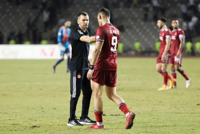 Stephen Glass with striker Christian Ramirez at full time