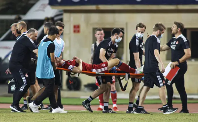 Andrew Considine was carried off on a stretcher early in the first half