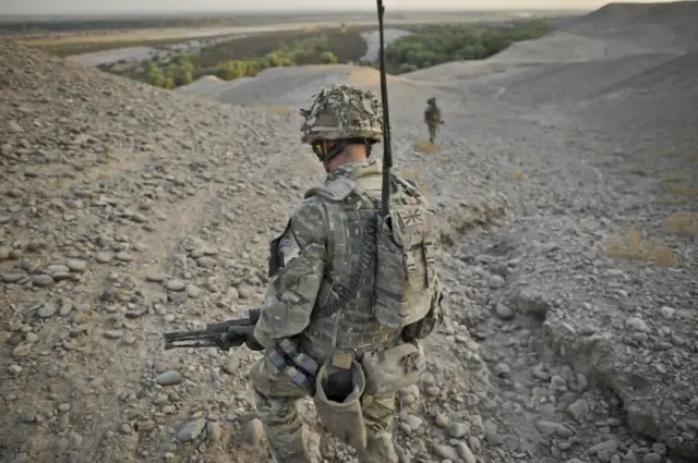 A British soldier on patrol in Afghanistan