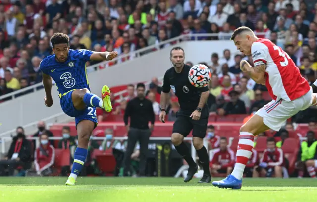 Granit Xhaka blocks Reece James' shot