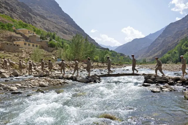 Newly absorbed personnel in the Afghan security forces take part in a military training in Bandejoy area of Dara district in Panjshir province