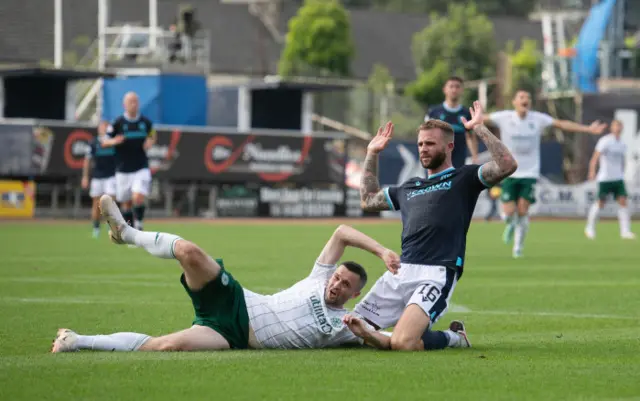 Jamie Murphy is brought down by Dundee's Christie Elliott