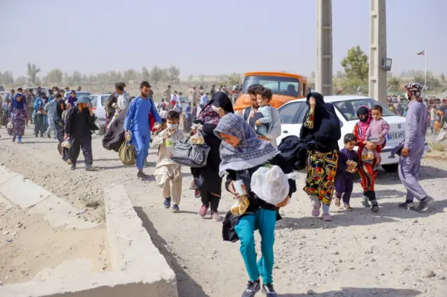 Afghan refugees arrive in Sistan-Blochestan province, south-eastern Iran on 16 August 2021