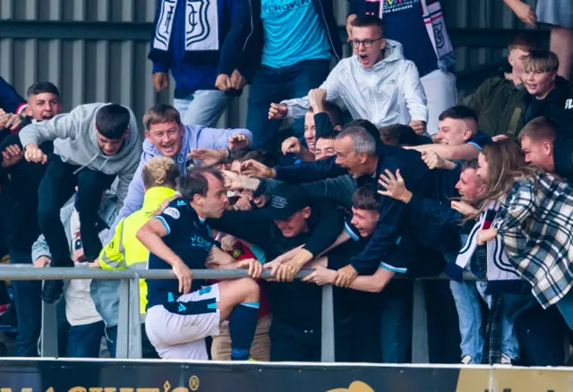 Paul McGowan celebrates his equaliser