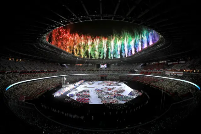 Fireworks light up the sky above the Tokyo National Stadium