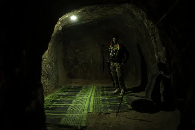 An Afghan National Army stands in a captured ISIS-K prison in 2017.