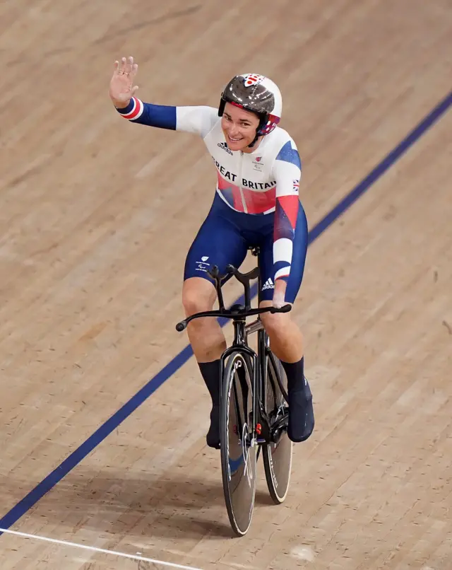 Sarah Storey waves after winning gold in Tokyo