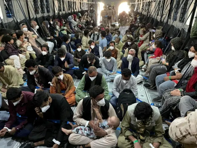 Afghan citizens board a Spanish military plane in Kabul. Photo: 24 August 2021