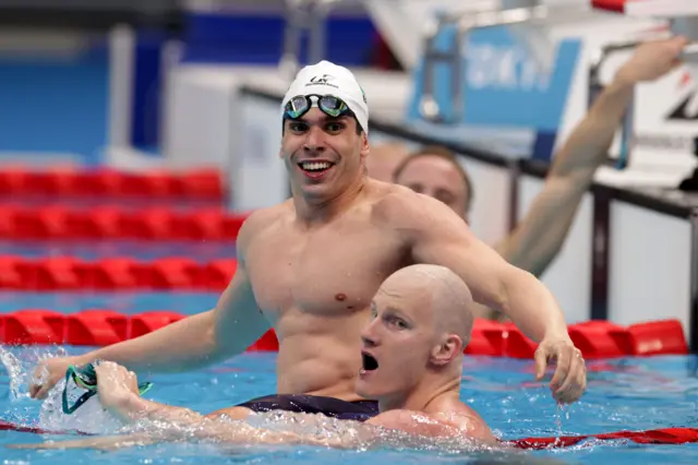 Rowan Crothers of Team Australia celebrates winning gold in the Men's 50m Freestyle - S10 final with bronze medal winner Phelipe Andrews Melo Rodrigues