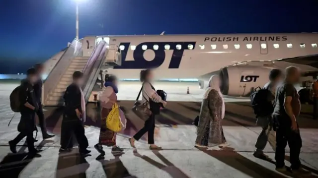 Evacuees from Kabul before their departure to Warsaw from Navoiy International Airport in Uzbekistan, in Navoiy, Uzbekistan, 20 August 2021