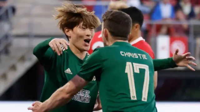 Kyogo Furuhashi celebrates with Ryan Christie