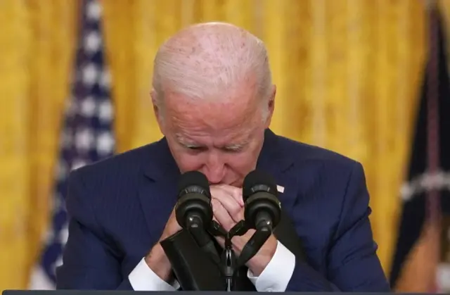 US President Joe Biden reacts to a reporter's question at the White House, Washington DC. Photo: 26 August 2021