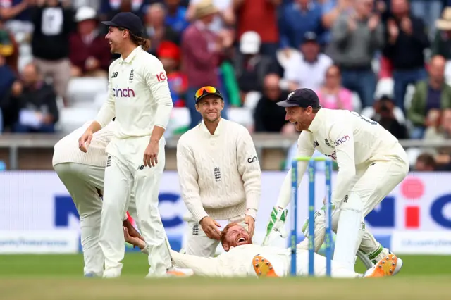 Jonny Bairstow and England celebrate the wicket of KL Rahul in the third Test at Headingley