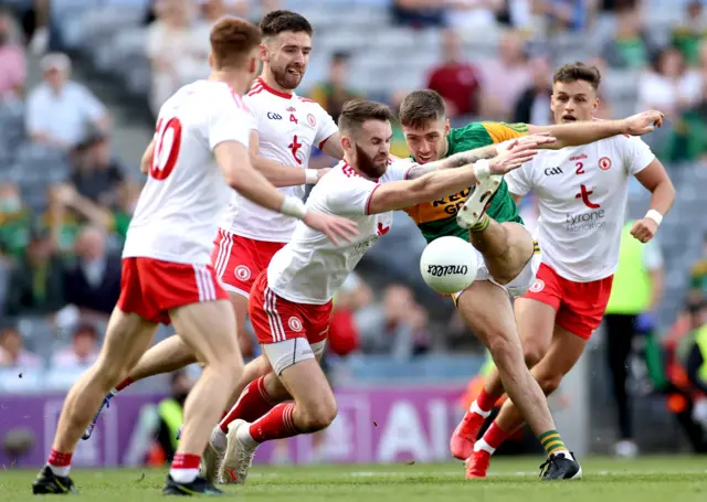 Ronan McNamee charges down an attempt on goal