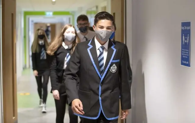 schoolchildren in corridor