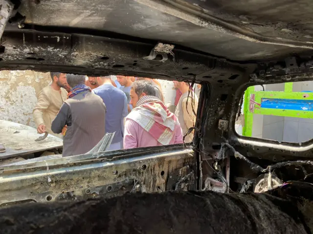 Destroyed car at the site of a US drone strike in Kabul