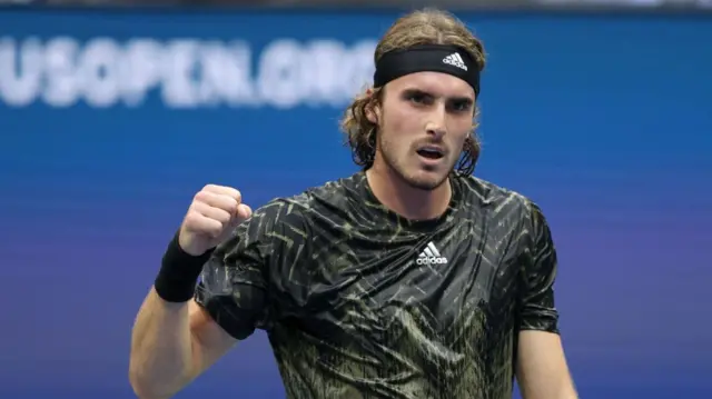 Stefanos Tsitsipas fist pumps in celebration