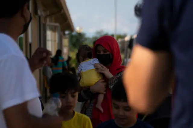 Evacuees at a refugee centre near Turin, Italy