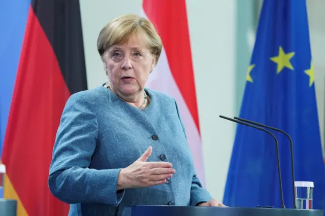 German Chancellor Angela Merkel speaks at a news conference in Berlin, Germany, on 31 August 2021