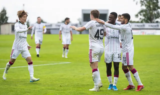 James Forrest celebrates scoring Celtic's third goal