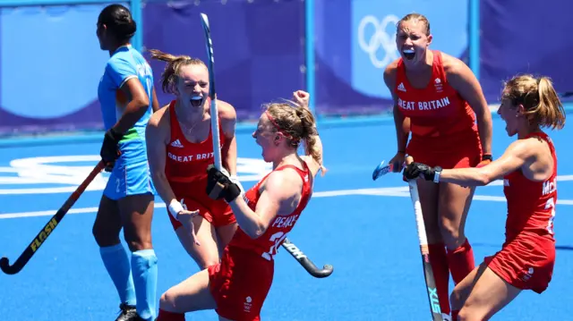 Hollie Pearne-Webb celebrates with her team-mates