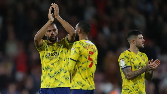 West Brom players applaud fans