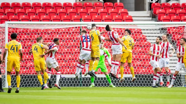 Liam Moore scores with a header