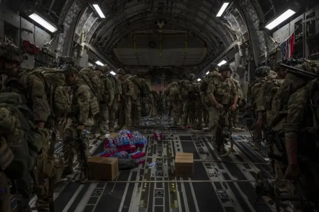 Soldiers on a cargo plane