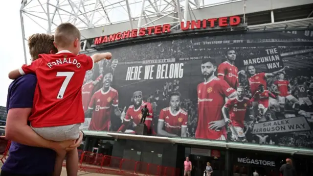 Child with Ronaldo shirt at Old Trafford