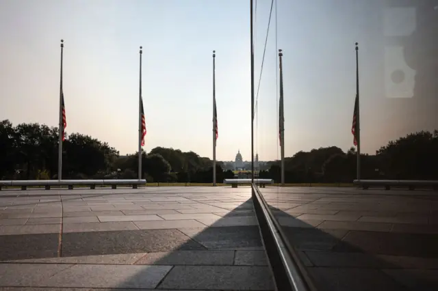 Flags encircling the Washington Monument are flown at half staff on September 11, 2021 in Washington, DC