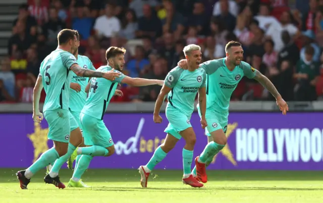 Leandro Trossard celebrates scoring for Brighton