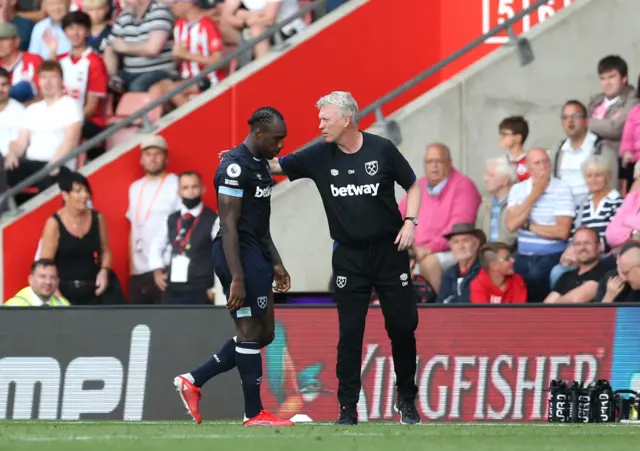 Michail Antonio walks off after a red card