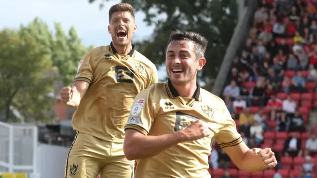 Ben Garrity celebrates his goal for Port Vale