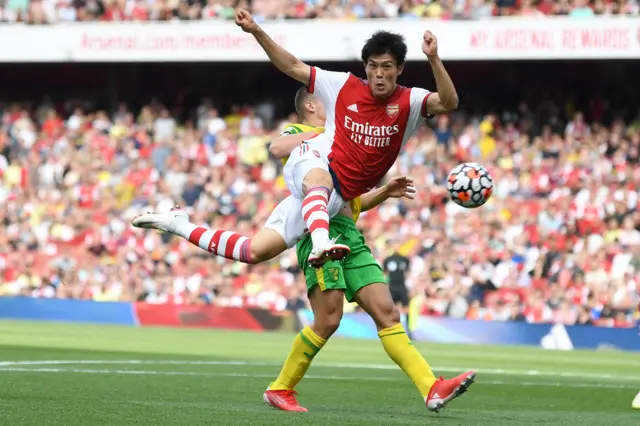 Takehiro Tomiyasu has a shot for Arsenal