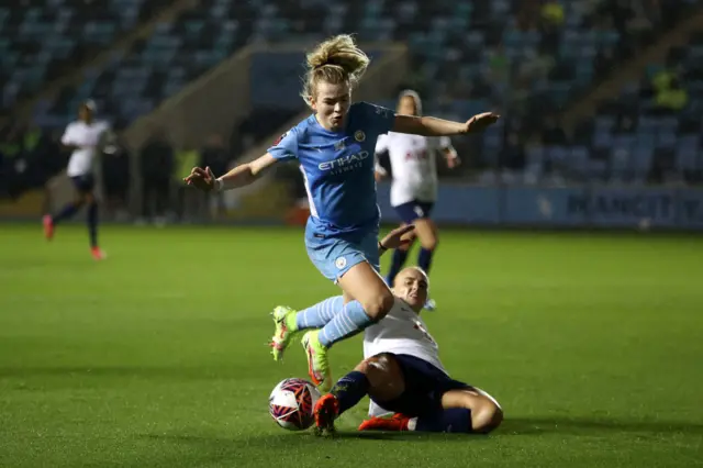 Lauren Hemp is tackled