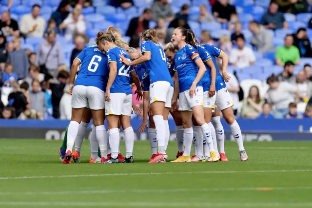 Everton players in a huddle in their WSL defeat by Man City