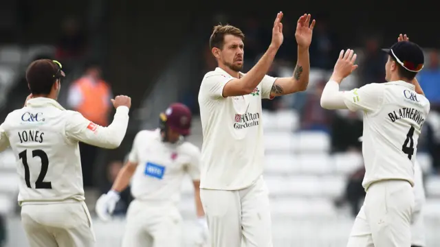 Tom Bailey takes a wicket for Lancashire