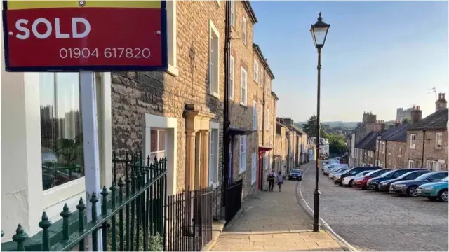 Sold signs can be seen dotted around Richmond, North Yorkshire