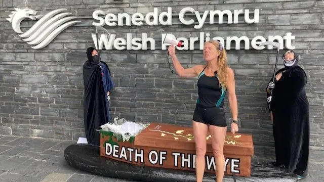 Protesters with coffin outside Welsh Parliament