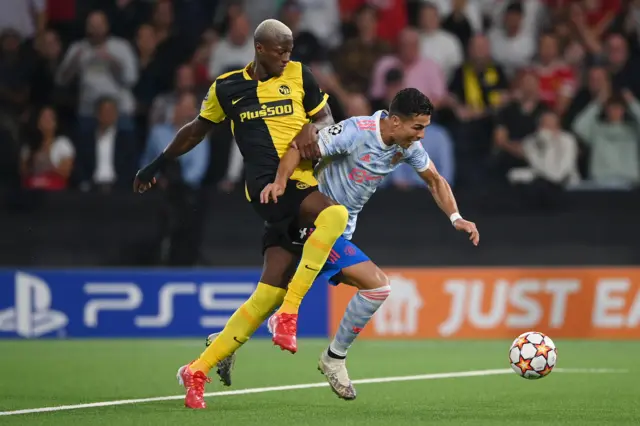 Cristiano Ronaldo is challenged by Mohamed Camara