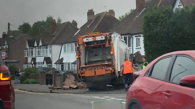 Bin lorry in garden